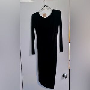 Black long sleeve, asymmetrical Tahari dress, good for work or evening events